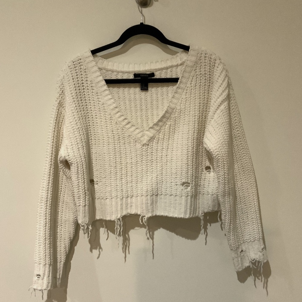 Cropped distressed knit sweater